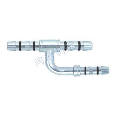 THREE-WAY OIL RETURN FITTING